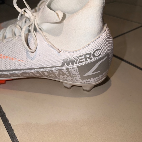 This is a pair of Nike Mercurial Superfly 6 Elite FG soccer cleats in white and main image 4